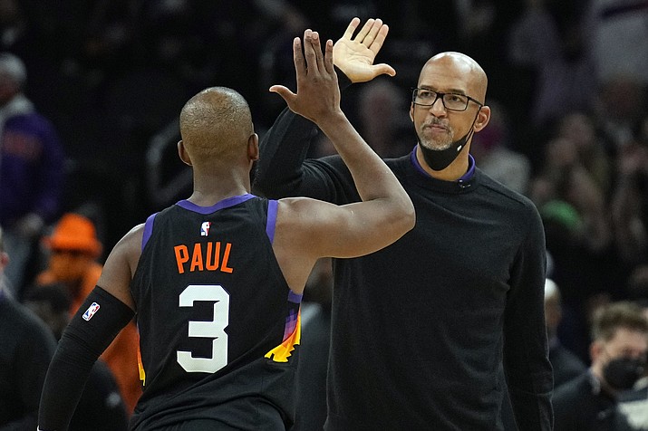 Phoenix Suns coach Monty Williams and guard Chris Paul (3) reacts after a timeout during the second half of the team's game against the Los Angeles Clippers, Thursday, Jan. 6, 2022, in Phoenix. The Suns won 106-89. (Rick Scuteri/AP)
