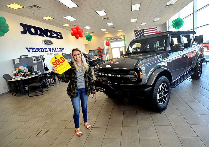 Customers can see the new Bronco at the Jones Ford in Camp Verde, but it’s already sold as indicated by a sign put on the SUV by employee Cybill Jones. (Verde Independent/Vyto Starinskas)