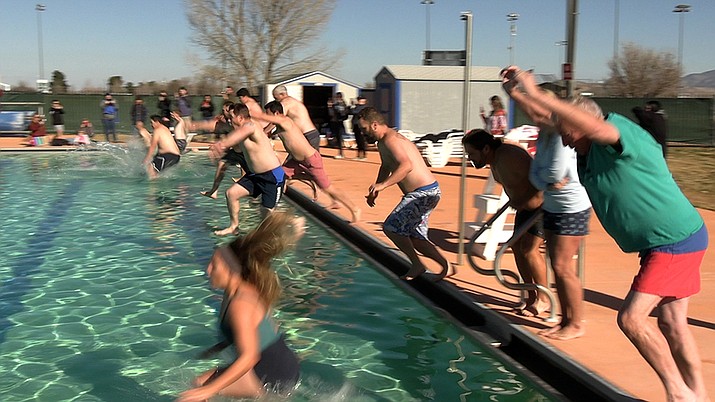 Brave jumpers took a frigid dip into icy-cold water at Prescott Valley’s annual Polar Bear Splash, on Saturday morning, Jan. 8, 2022. The free event included donuts and winter-themed games for all ages. All the splashers left with a commemorative shirt, and some won prizes. (Jesse Bertel/Courier)