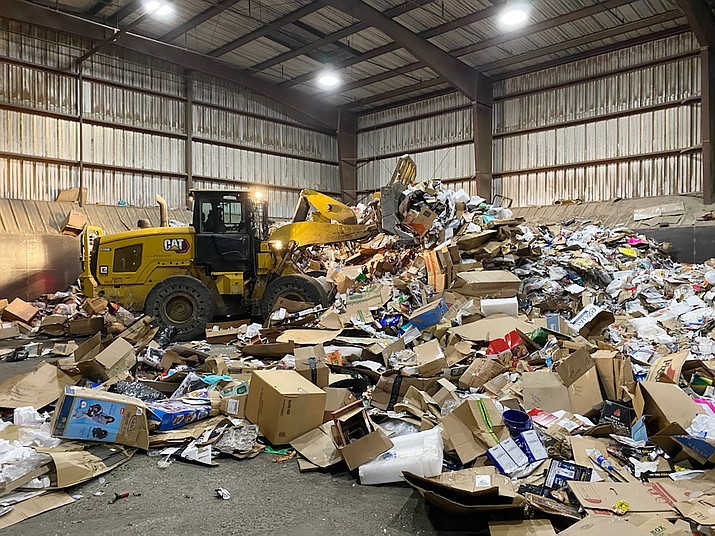 Recycled materials from the City of Prescott are piled at the Sundog Transfer Station before being loaded up and transported to the City of Phoenix’s North Gateway Materials Recovery Facility (MRF) for processing. (Brady Higgs, Prescott Solid Waste Division/Courtesy)