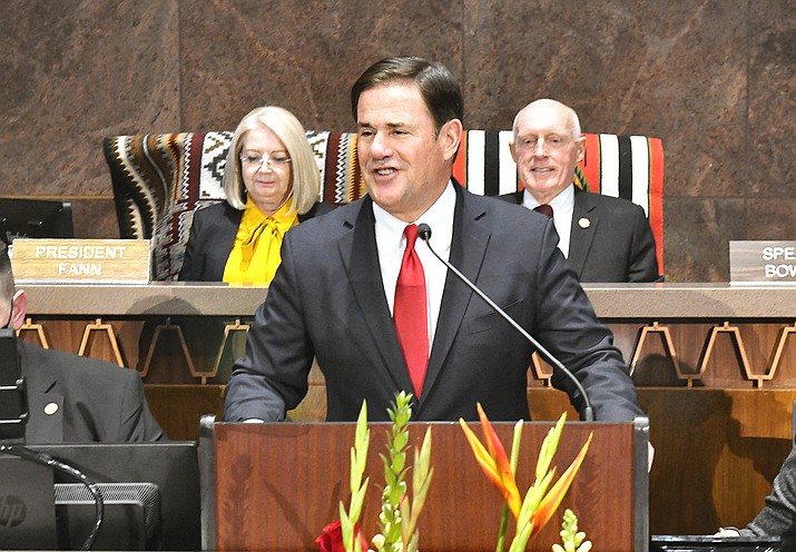 Gov. Doug Ducey speaks Monday, Jan. 11, 2022, to the Arizona Legislature in his final State of the State speech, while Senate President Karen Fann, R-Prescott, and House Speaker Rusty Bowers, R-Mesa, look on. It was Ducey’s final speech because he is term limited and cannot run for governor again. (Howard Fischer, Capitol Media Services)