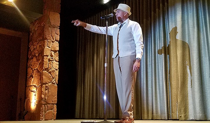 Damien Flores, of Albuquerque, performs at the Sedona Poetry Slam in November. A published author and teacher, Flores was the guest featured poet between competitive rounds. (Courtesy photo)