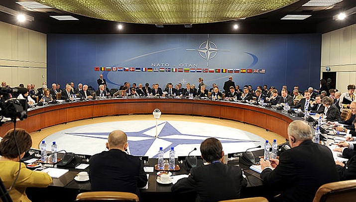 NATO and Russian officials have agreed to hold more meetings in an attempt to defuse tensions between Russia and Ukraine. Defense and foreign affairs officials from NATO nations are shown meeting at NATO headquarters in Brussels, Belgium, in this file photo. (Public domain)