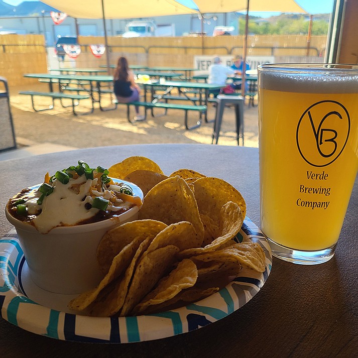 Beer and eats at Verde Brewing with a view of the outdoor patio. (Verde Brewing /Courtesy)