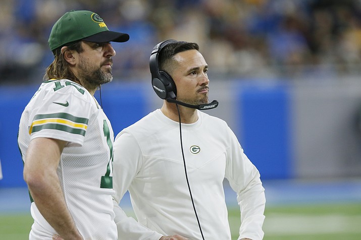 Green Bay Packers quarterback Aaron Rodgers and head coach Matt LaFleur watch from the sideline during the second half of an NFL football game against the Detroit Lions, Sunday, Jan. 9, 2022, in Detroit. (Duane Burleson/AP)