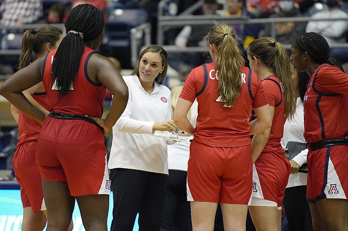 Arizona head coach Adia Barnes speaks to her team during a time out in the first half of a game against Northern Arizona, on Dec. 17, 2021, in Flagstaff.  (Rick Scuteri/AP)