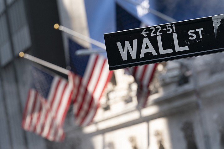 A sign for Wall Street hangs in front of the New York Stock Exchange, July 8, 2021. (Mark Lennihan/AP, file)