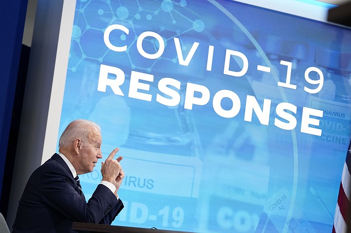 President Joe Biden speaks about the government's COVID-19 response, in the South Court Auditorium in the Eisenhower Executive Office Building on the White House Campus in Washington, Thursday, Jan. 13, 2022. (Andrew Harnik/AP)