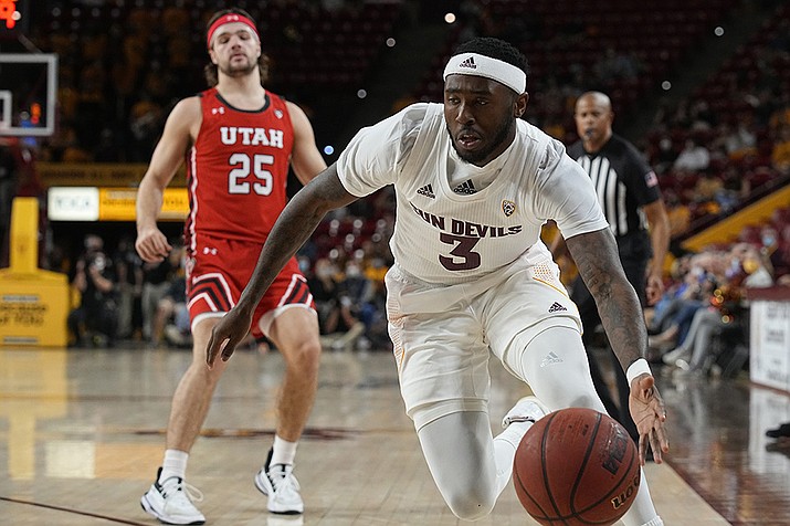 Arizona State guard Marreon Jackson (3) strips the ball from Utah guard Rollie Worster (25) during the first half of an NCAA college basketball game, Monday, Jan. 17, 2022, in Tempe, Ariz. (Rick Scuteri/AP)