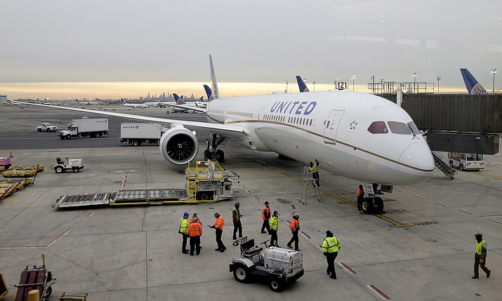 A Dreamliner 787-10 arriving from Los Angeles pulls up to a gate at Newark Liberty International Airport in Newark, N.J., Monday, Jan. 7, 2019. Federal safety officials are directing operators of some Boeing planes to adopt extra procedures when landing on wet or snowy runways near impending 5G service because, they say, interference from the wireless networks could mean that the planes need more room to land.The Federal Aviation Administration said Friday, Jan. 14, 2022, that interference could delay systems like thrust reversers on Boeing 787s from kicking in, leaving only the brakes to slow the plane. (Seth Wenig/AP, File)