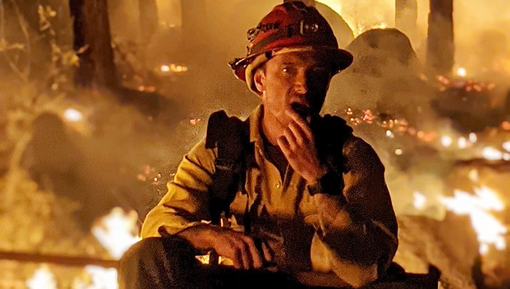 The Biden administration has introduced a $50 billion plan to stave off catastrophic wildfires. Hotshot firefighter Andy Leach is pictured at the Flag Fire in the Hualapai Mountains in April, 2021. (Courtesy photo)