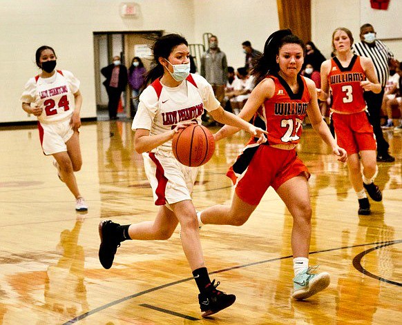 Grand Canyon’s Xochitl Galvan takes the ball down the court during a Jan. 12 home game against Williams. (Cyndi Moreno/WGCN)