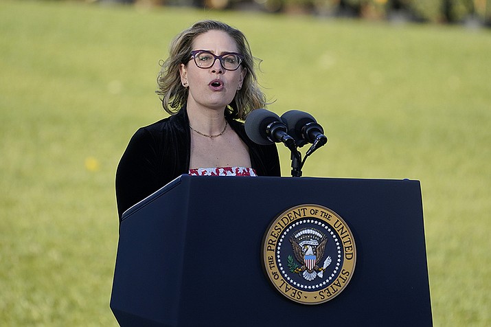 Sen. Kyrsten Sinema, D-Ariz., speaks before President Joe Biden signs the $1.2 trillion bipartisan infrastructure bill into law during a ceremony on the South Lawn of the White House in Washington, on Nov. 15, 2021. (Evan Vucci, AP File)