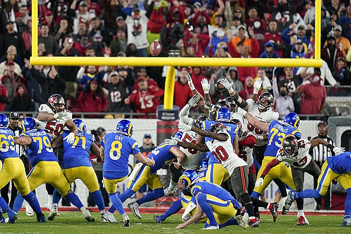 Los Angeles Rams' Matt Gay (8) kicks a 30-yard field goal to defeat the Tampa Bay Buccaneers during the second half of an NFL divisional round playoff football game Sunday, Jan. 23, 2022, in Tampa, Fla. (John Raoux/AP)