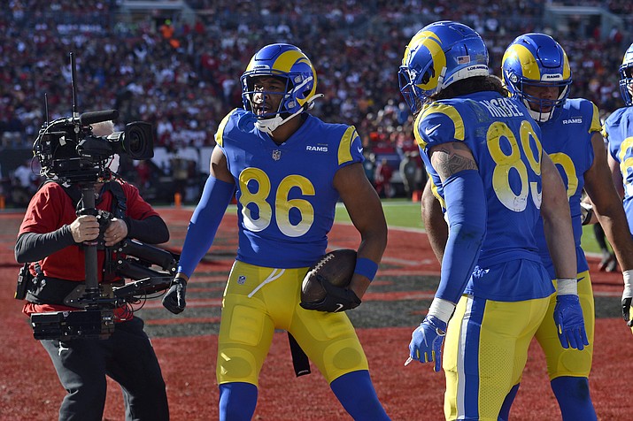 Los Angeles Rams tight end Kendall Blanton (86) celebrates his 7-yard touchdown reception against the Tampa Bay Buccaneers during the first half of a divisional round playoff game Sunday, Jan. 23, 2022, in Tampa, Fla. (Jason Behnken/AP)