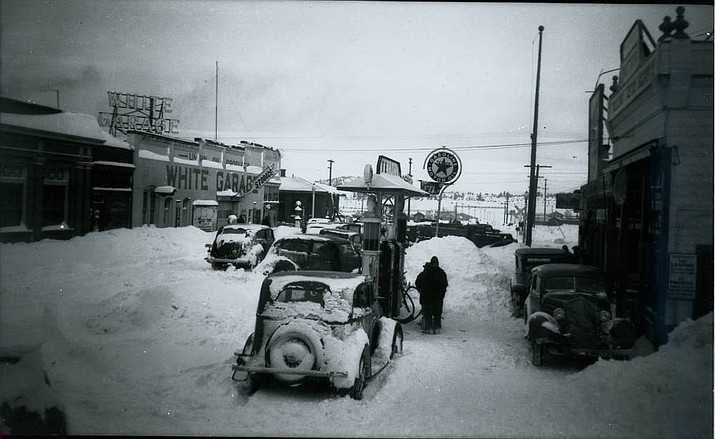 An early gas station after a snowfall on Historic Route 66 in 1936. The building was originally a store front that was converted to a gas station.  It later became a parts store and was later refurbished and opened as a restaurant. (Photo/Williams Historic Photo Archive)