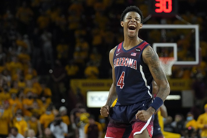 Arizona guard Dalen Terry reacts after scoring against Arizona State during the first half of a game, Monday, Feb. 7, 2022, in Tempe, Ariz. (Rick Scuteri/AP)