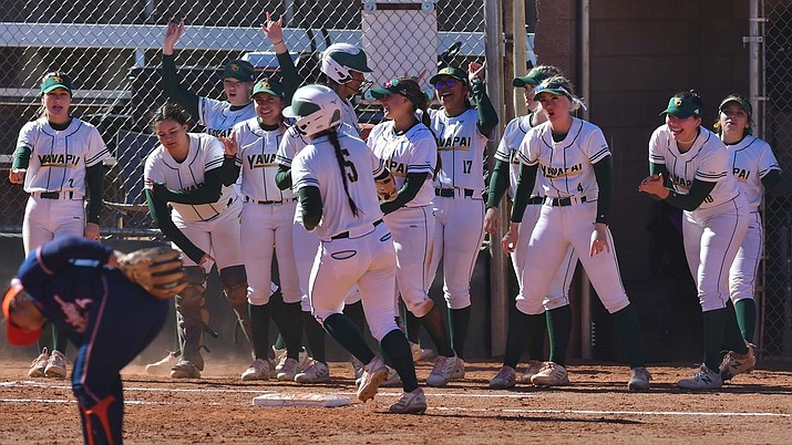 The Yavapai College softball team comes out of the dugout to celebrate a scoring play as Gabie Fregoso (5) rounds the bases during a game against Pima on Tuesday, Feb. 8, 2022, at Bill Vallely Field in Prescott. (Yavapai Athletics/Courtesy)
