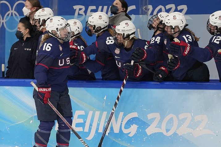 United States' Hayley Scamurra (16) is congratulated after scoring a goal against Finland during a women's semifinal hockey game at the 2022 Winter Olympics, Monday, Feb. 14, 2022, in Beijing. (Petr David Josek/AP)