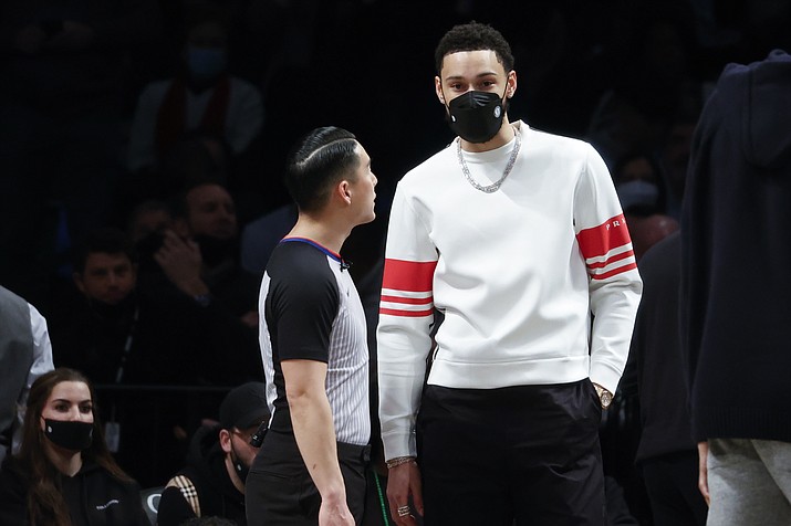 Brooklyn Nets' Ben Simmons, right, looks on during the second half of a  game against the Sacramento Kings, Monday, Feb. 14, 2022, in New York. (Corey Sipkin/AP)