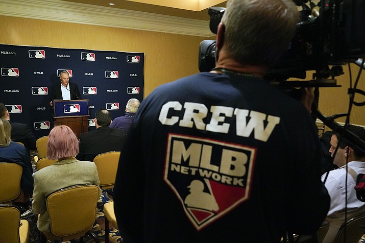 Major League Baseball commissioner Rob Manfred makes comments during a news conference at MLB baseball owners meetings, Thursday, Feb. 10, 2022, in Orlando, Fla. Manfred says spring training remains on hold because of a management lockout and his goal is to reach a labor contract that allows opening day as scheduled on March 31. (John Raoux/AP)