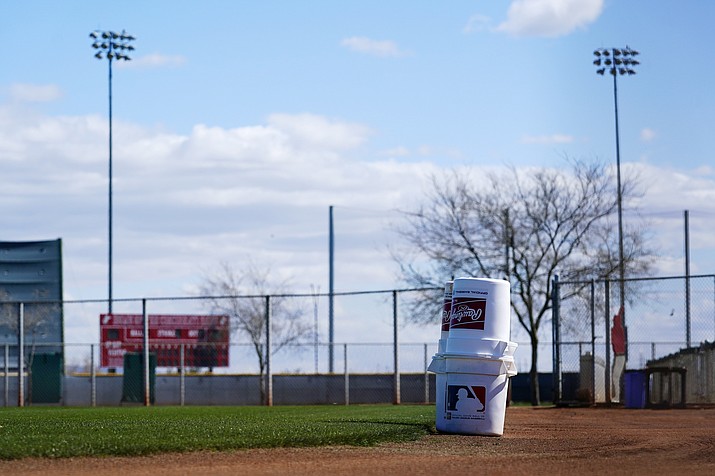 A practice field at the Cincinnati Reds spring training complex sits empty as pitchers and catchers are not starting spring training workouts as scheduled as the Major League Baseball lockout enters its 77th day and will prevent pitchers and catchers from taking the field for the first time since October Wednesday, Feb. 16, 2022, in Goodyear. (Ross D. Franklin/AP)