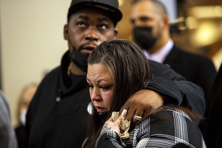 Daunte Wright's parents, Aubrey Wright and Katie Wright, who also sometimes uses the name Katie Bryant, react after former Brooklyn Center Police Officer Kim Potter was sentenced to two years in prison, Friday, Feb. 18, 2022 in Minneapolis. Potter was convicted in December of both first-degree and second-degree manslaughter in the April 11 killing of Wright, a 20-year-old Black motorist. (Nicole Neri/AP)