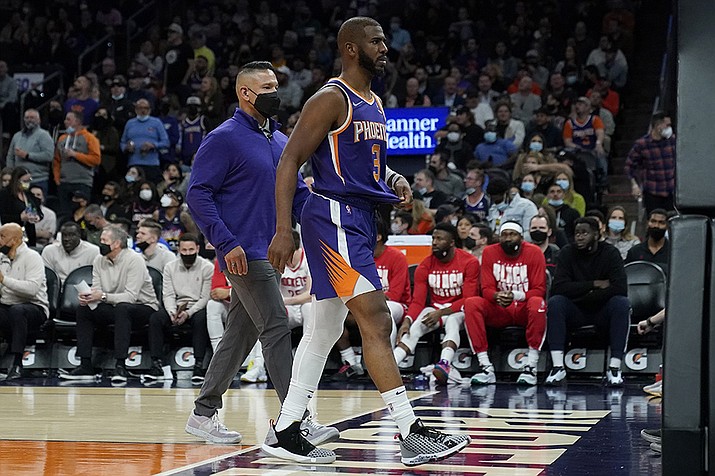 Phoenix Suns guard Chris Paul (3) leaves the game after being ejected against the Houston Rockets during the second half of an NBA basketball game Wednesday, Feb. 16, 2022, in Phoenix. The Suns won 124-121. (Matt York/AP)