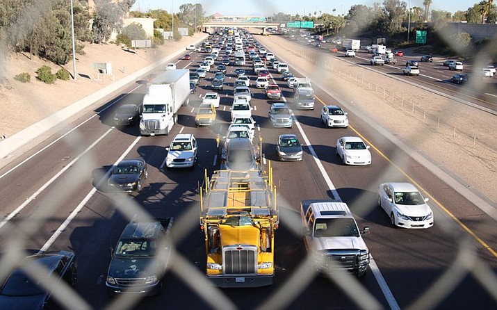 Rush hour traffic on Interstate 10 through Phoenix in a 2018 file photo. New data from the National Highway Traffic Safety Administration shows that the number of traffic fatalities in the first nine months of 2021 jumped sharply from previous years, both in Arizona and the U.S. as a whole. (Jessica Clark/ Cronkite News, File)
