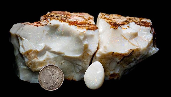 This photo shows an opal specimen, Dec. 20, 2021. One of the largest opals in the world was sold for nearly $144,000 at auction in Alaska on Sunday, Feb. 20, 2022. The opal, dubbed the “Americus Australis,” weighs more than 11,800 carats and is one of the largest gem-quality opals in existence, according to the auction house Alaska Premier Auctions & Appraisals. (Dana Fuentes/Alaska Premier Auctions and Appraisals via AP)