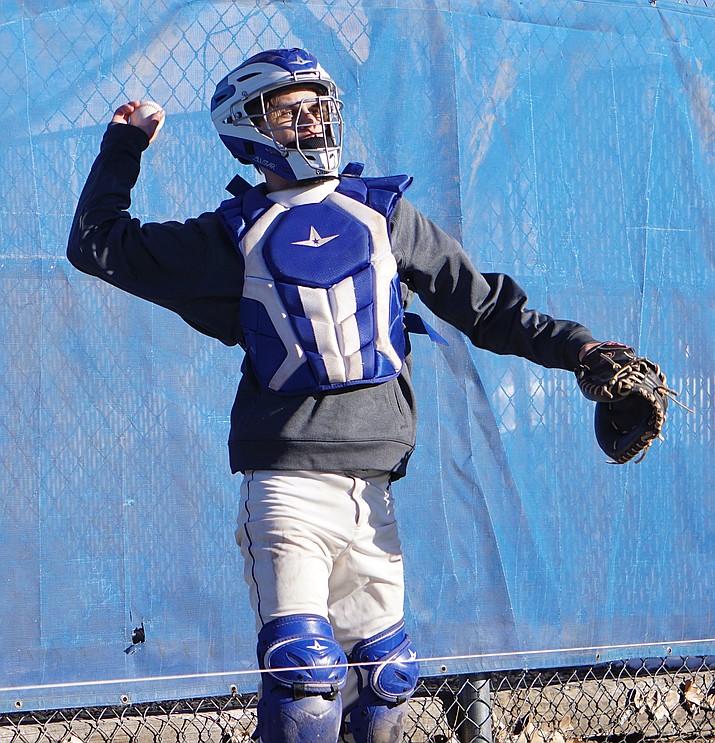 Chino Valley catcher Auron Stuller throws back a ball to the pitcher during bullpen practice on Thursday, Feb. 24, 2022, at Chino Valley High School. (Aaron Valdez/Courier)