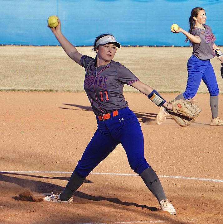 Chino Valley pitcher Marae Hooper (11) throws a warm-up pitch prior to an inning during a game against Sedona Red Rock on Tuesday, March 1, 2022, in Chino Valley. (Aaron Valdez/Courier)