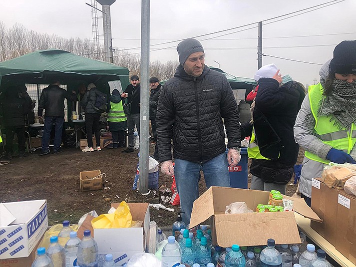 Serghei Moraru of Moldova was among volunteers helping Ukrainian refugees entering the small nation last week as their country was invaded by Russia. (Serghei Moraru/Facebook)