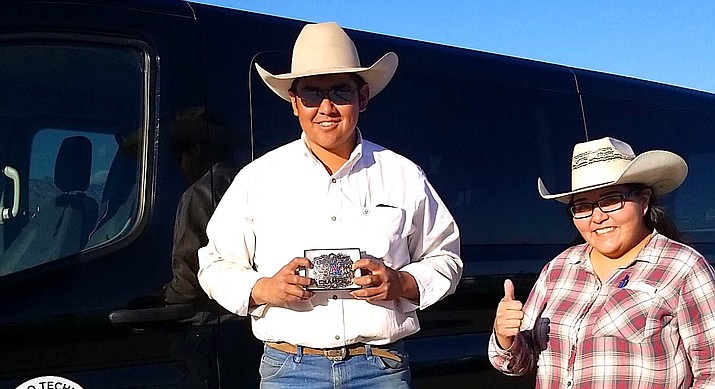 Navajo Technical University Rodeo Team’s all-around cowboy Rooster Yazzie and Coach Nicole Pino are excited about the 2022 spring rodeo season. The Coyote Canyon steer wrestler won the event at the University of Arizona Rodeo in Tucson, Arizona, March 5. (Photo/NTU)