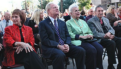 Four Arizona governors who were affected by the line of succession: Jane Hull, who succeeded Fife Symington, sitting on her left, after he was convicted of a crime; Rose Mofford who became governor after Evan Mecham was impeached and convicted; and Raul Castro who quit to become ambassador to Argentina. And this 2009 photo was at the inauguration of Jan Brewer who took over after the resignation of Janet Napolitano. (Capitol Media Services file photo by Howard Fischer)