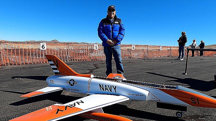 Chino Valley Flyers club member Dan Avilla with his model jet, which has a turbine engine. (Jesse Bertel/Review)