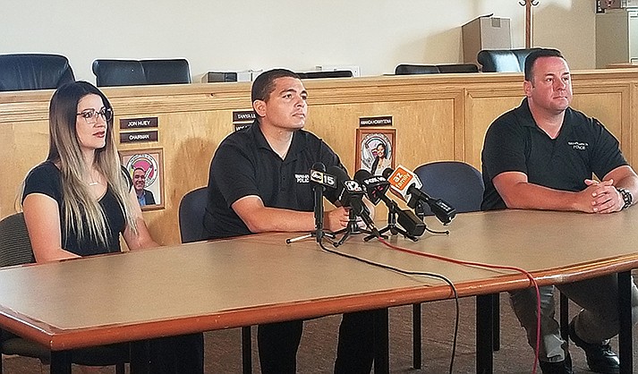 Yavapai-Apache Police Sgt. Preston Brogdon sat between his wife Bailey and YAPD Chief Nathan Huibregtse during a press conference April 19 at the Yavapai-Apache Council chambers in Camp Verde. (The Verde Independent/Lo Frisby)