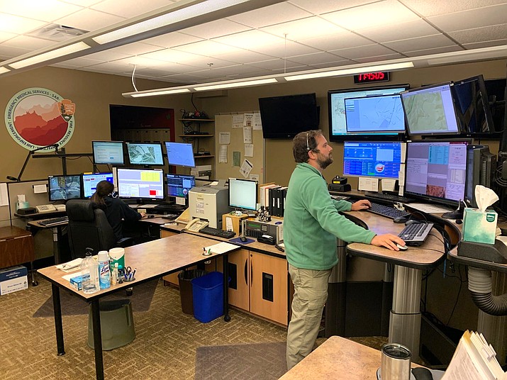 Grand Canyon National Park dispatchers respond to incoming calls at the Grand Canyon Regional Communications Center. (NPS photos)