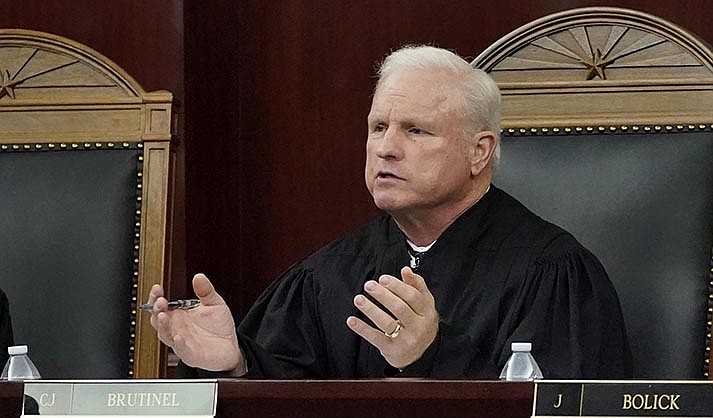 Arizona Supreme Court Chief Justice Robert M. Brutinel speaks during oral arguments, in Phoenix last year. (AP Photo/Matt York, File)