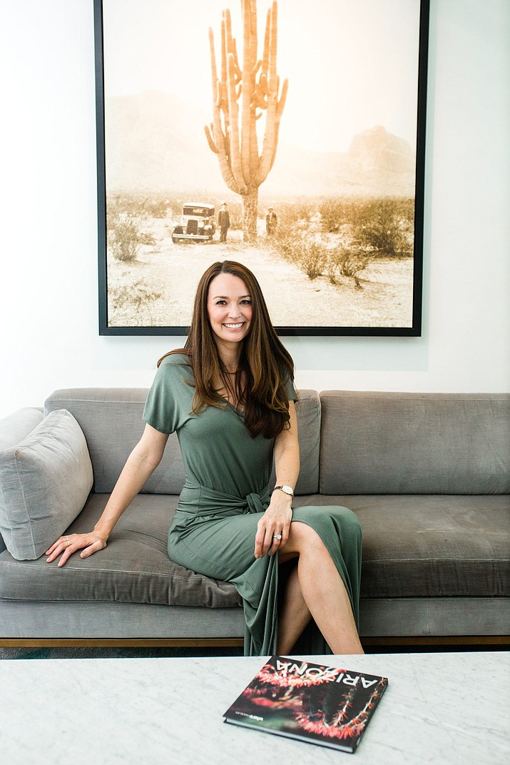 Angela Zdrale, founder of LivTall, models one of the wrap dresses she created for tall women. LivTall is just one brand in Arizona that’s prioritizing sustainable practices. (LivTall/Courtesy via Cronkite News)