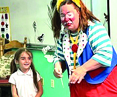 Skeeter the Clown visits with students at Heritage Elementary April 21. (Photo courtesy of Heritage Elementary School)