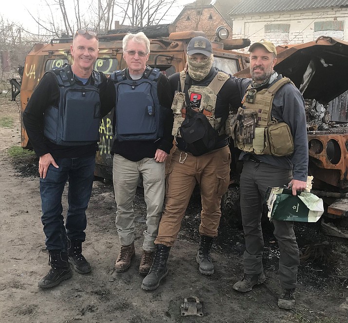 Local retired surgeon Tom Rusing, second from right, recently traveled to Ukraine, where he spent a month looking for ways to help provide medical services to people wounded in the war with Russia. For a time, he traveled with a group of international workers who were also helping the effort. (Tom Rusing/Courtesy)