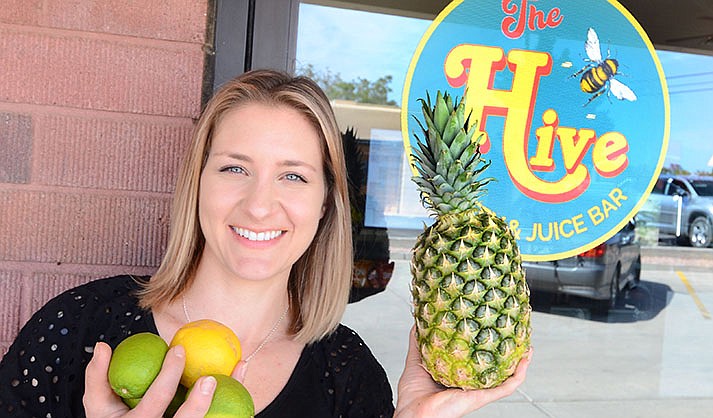 Chelsea Honey poses at the new Hive Eatery & Juice Bar on Main Street in Cottonwood on Thursday, April 28, 2022. (The Verde Independent/Vyto Starinskas)