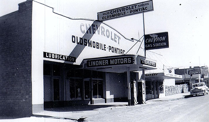 Lindner Motors with gasoline pumps on the curb. The neighboring bakery had been J.O. Braley’s auto parts store next to Brayley’s Auto Court. (Courtesy of Curt Lindner.)