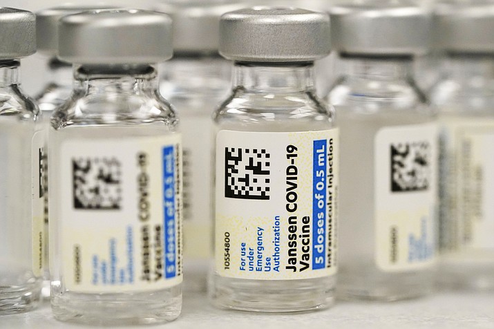 Vials of the Johnson & Johnson COVID-19 vaccine are seen at a pharmacy in Denver on Saturday, March 6, 2021. On Thursday, May 5, 2022, U.S. regulators strictly limited who can receive this vaccine due to a rare but serious risk of blood clots. (David Zalubowski/AP, File)