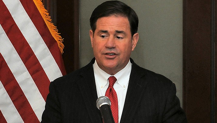 Gov. Doug Ducey signed legislation Friday limiting the ability of his successor to tap into the emergency powers that he used for more than two years in response to the COVID-19 pandemic. (File photo by Howard Fischer/For the Miner)