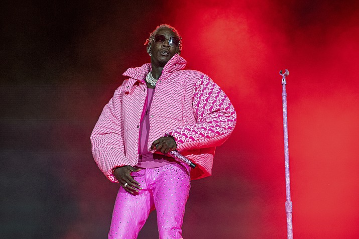 Young Thug performs on day four of the Lollapalooza Music Festival on Sunday, Aug. 1, 2021, at Grant Park in Chicago. The Atlanta rapper, whose name is Jeffery Lamar Williams, was arrested Monday, May 9, 2022, in Georgia on conspiracy to violate the state's RICO act and street gang charges, according to jail records. (Amy Harris/Invision/AP, File)