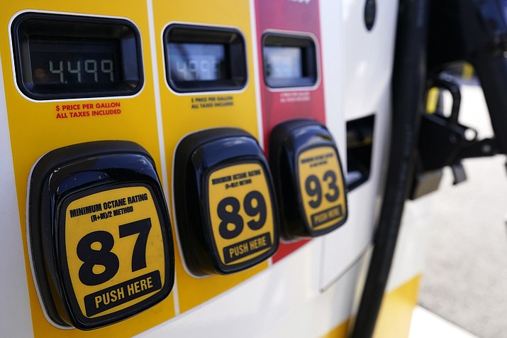 Gasoline prices are displayed at a gas station in Vernon Hills, Ill., Friday, April 1, 2022. The dollars-and-cents counter on the gas pump seems to be spinning faster these days with U.S. gasoline prices hitting another record high on Tuesday, May 10. (Nam Y. Huh/AP, File)