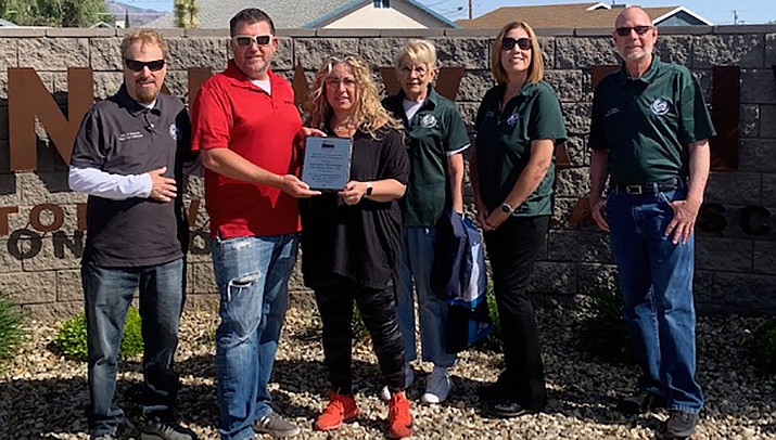 Kevin and Stephanie Wilkerson of Innovative Stoneworks and Landscaping recently accepted a Kingman Clean City Commission Community Recognition award. From left are Kingman Clean City Commission Vice-Chair Rod Obergh, Kevin Wilkerson, Stephanie Wilkerson, Clean City Commissioner Kathy Bowman, Clean City Chair Teresa Woods and Clean City Commissioner Randy Carpenter. (Courtesy photo)