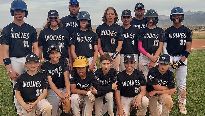 The White Cliffs Middle School seventh-grade baseball team went undefeated this season with a 12-0 record. Back row from left are Assistant Coach Shaun Munn  and Head Coach Randy Nelson. Middle row from left are Dylan Norbert. Caleb Jackson, Canton Collins, Pax McFadyen, Austin Branch, Garrick Hallman and Devon Dubay. Front row from left are Logan Munn, Jeremy Feil, Terrance Smith, Nathan Ballard, Hunter Stucki and Brody Depuy. (Courtesy photo)